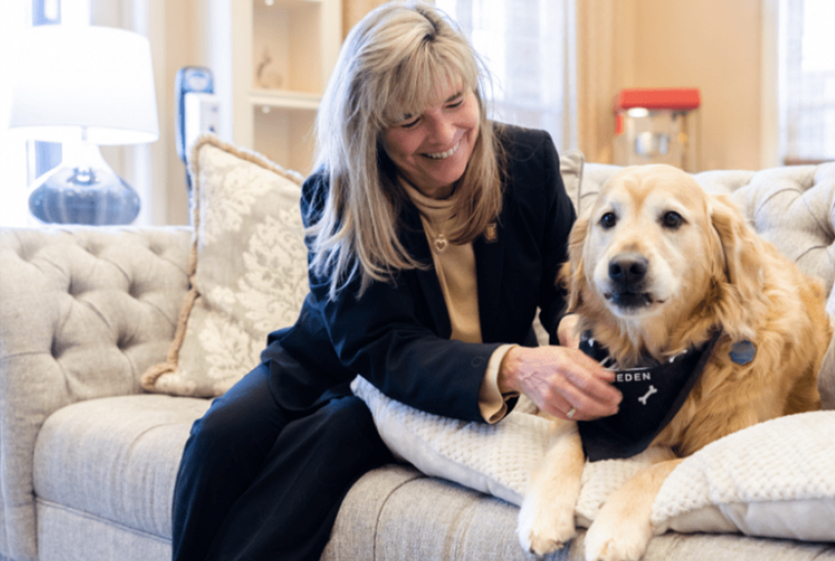 Woman with Dog on Couch